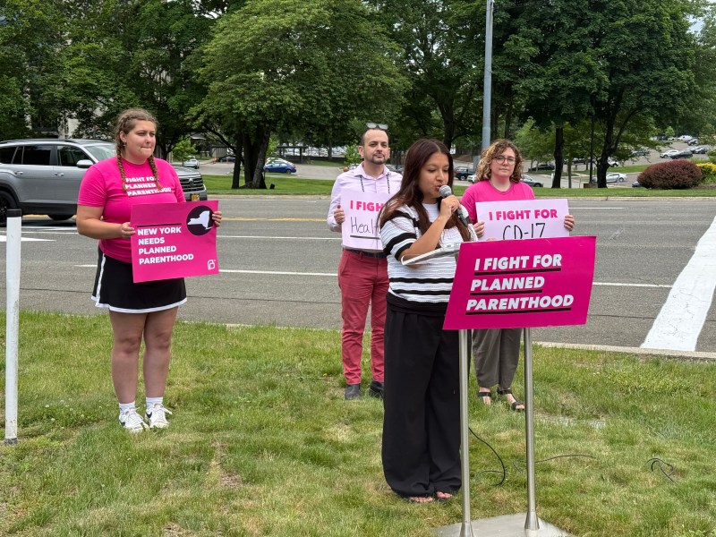 Photo of a Planned Parenthood protest where NY-17 constituents call out Rep. Lawler