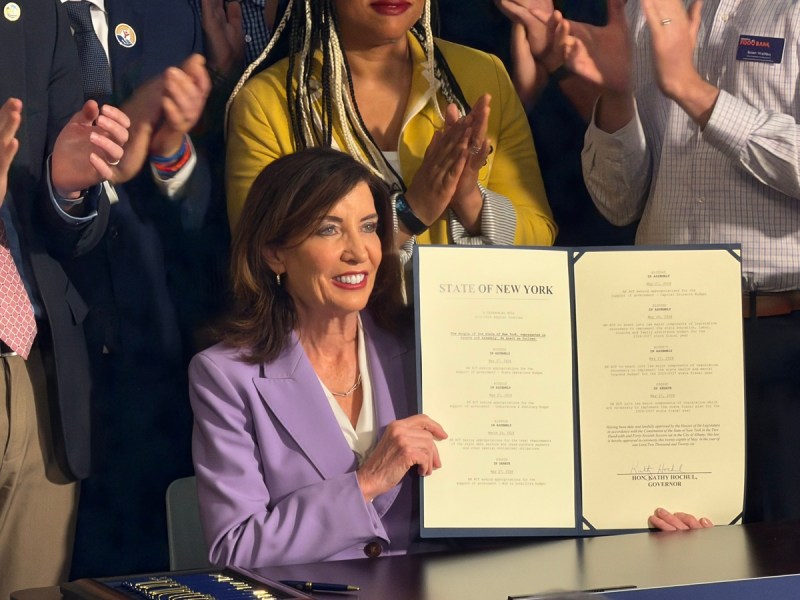 Kathy Hochul holds up budget, which contains new NY anti-ICE law