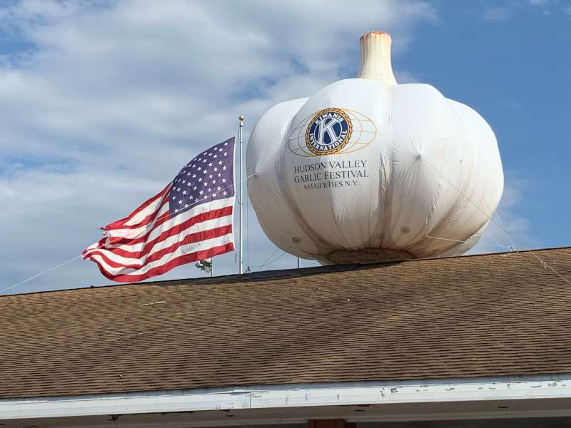 Hudson Valley Garlic Festival inflatable garlic bulb on top of building